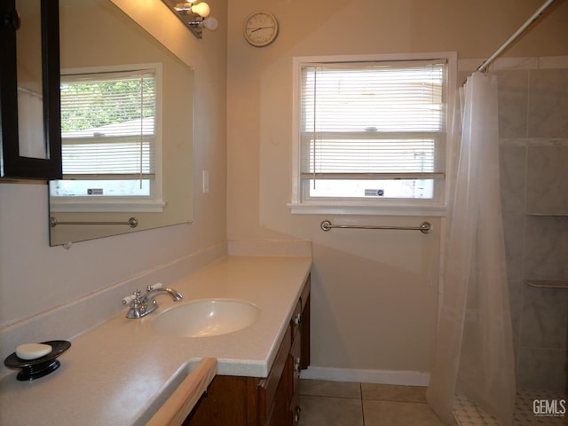 101 Oakdale Dr, Bakersfield, CA 93309 - full bath with vanity, healthy amount of natural light, tile patterned floors, and a tile shower