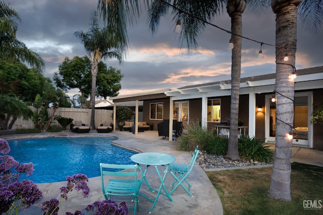 9900 Swansboro Way, Bakersfield, CA 93314 - pool at dusk featuring a patio
