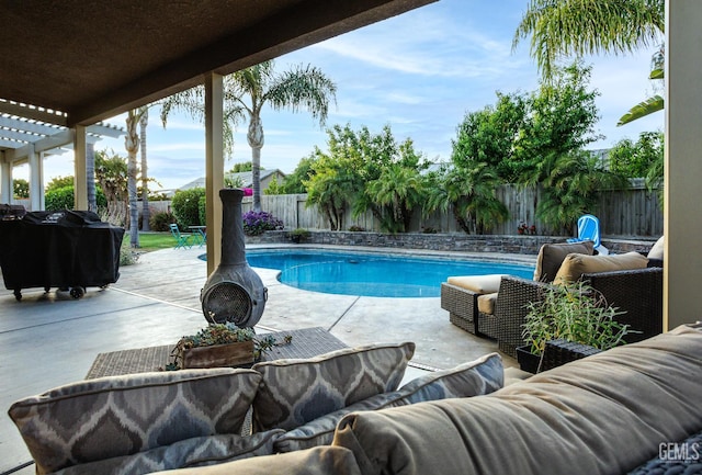 9900 Swansboro Way, Bakersfield, CA 93314 - view of swimming pool featuring outdoor lounge area, a fenced backyard, a grill, and a patio