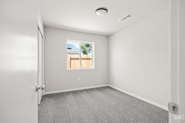 707 Poinsettia St, Bakersfield, CA 93307 - spare room featuring carpet flooring and baseboards