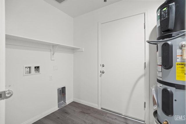 707 Poinsettia St, Bakersfield, CA 93307 - laundry room with water heater, dark wood-type flooring, baseboards, and washer hookup