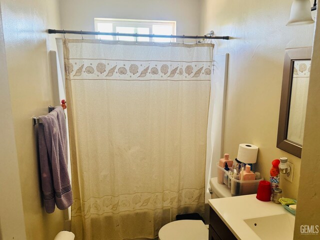 104 E Kern St, Taft, CA 93268 - bathroom with vanity and toilet