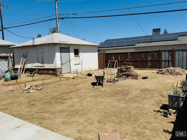 104 E Kern St, Taft, CA 93268 - fenced backyard featuring an outdoor structure
