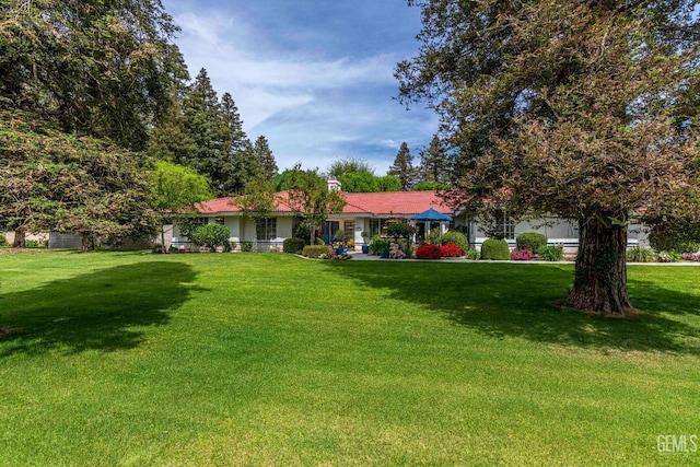 exterior space with a front yard