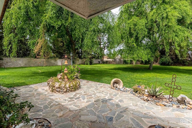 view of patio / terrace with fence