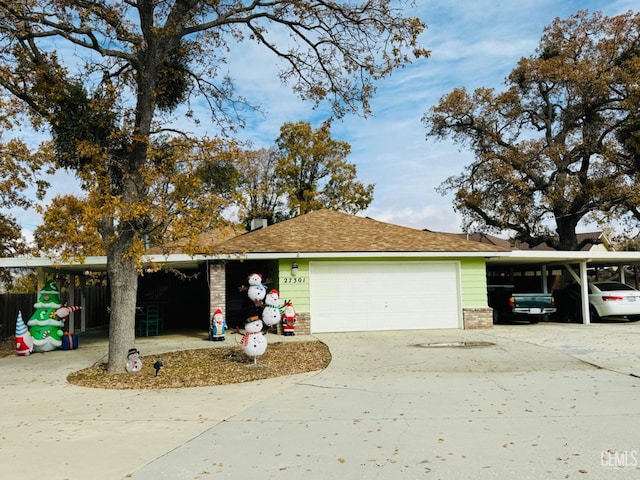 ranch-style home with a carport and a garage