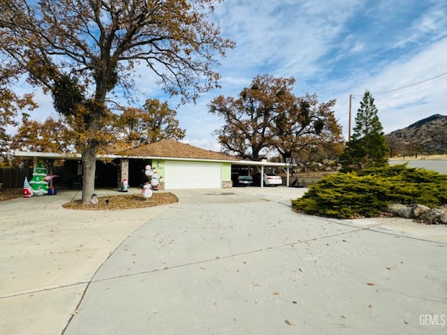 view of front of property with a carport