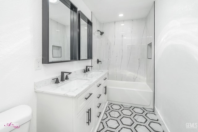 full bathroom featuring toilet,  shower combination, and vanity