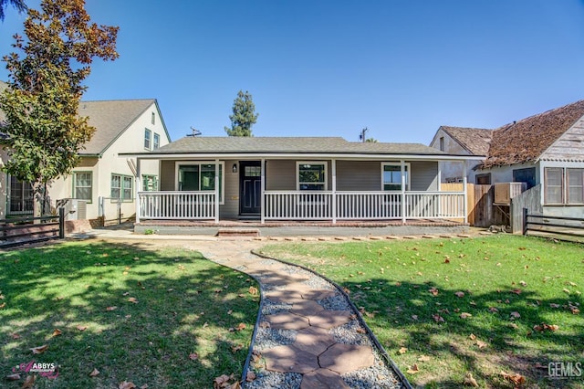 view of front of home featuring a front lawn and a porch