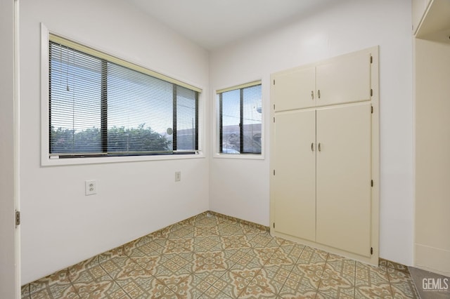 unfurnished bedroom with a closet