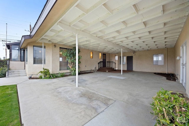 view of patio with a carport