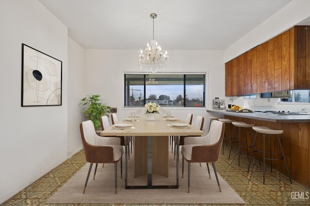 dining room with a chandelier