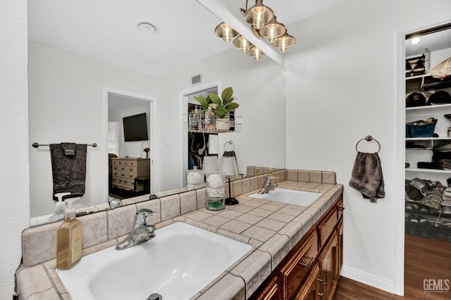 2316 Gosford Rd Unit R, Bakersfield, CA 93309 - full bath featuring wood finished floors and double vanity