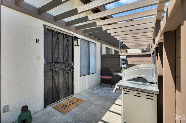 2316 Gosford Rd Unit R, Bakersfield, CA 93309 - view of patio featuring a pergola and area for grilling