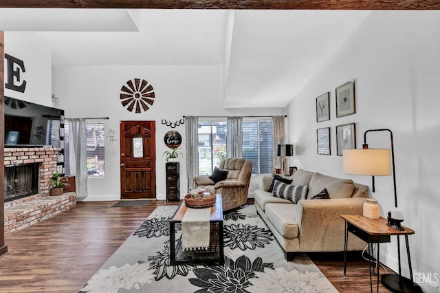 2316 Gosford Rd Unit R, Bakersfield, CA 93309 - living room with a brick fireplace and wood finished floors