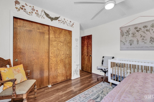 2316 Gosford Rd Unit R, Bakersfield, CA 93309 - bedroom featuring wood finished floors, ceiling fan, a closet, and a textured ceiling