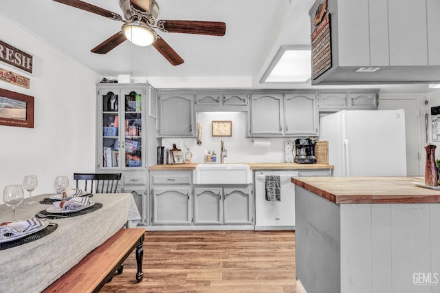 2316 Gosford Rd Unit R, Bakersfield, CA 93309 - kitchen with white appliances, wood counters, light wood-style flooring, and ceiling fan