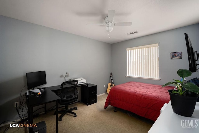 2119 Maganda Ave, Delano, CA 93215 - carpeted bedroom with a desk and a ceiling fan