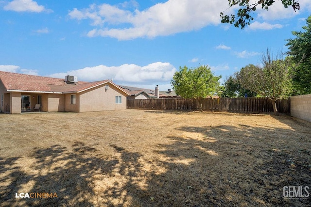 2119 Maganda Ave, Delano, CA 93215 - fenced backyard featuring central air condition unit