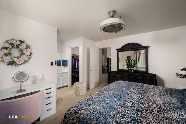 2119 Maganda Ave, Delano, CA 93215 - bedroom featuring light carpet, a walk in closet, and a closet