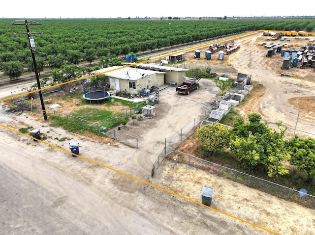 birds eye view of property with a rural view