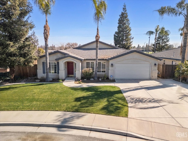 single story home featuring a garage and a front lawn