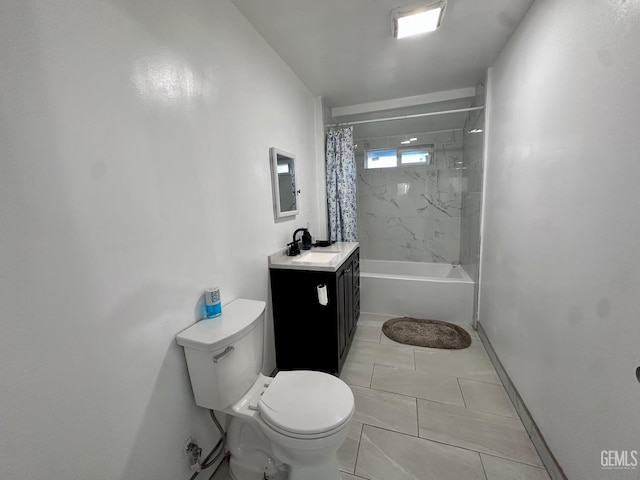 full bathroom featuring shower / tub combo with curtain, vanity, and toilet