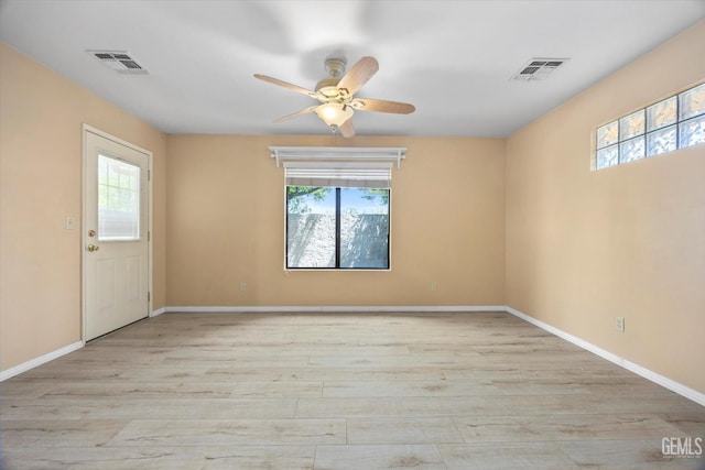 9408 Wandering Oak Dr, Bakersfield, CA 93311 - unfurnished room with a ceiling fan, wood finished floors, and baseboards