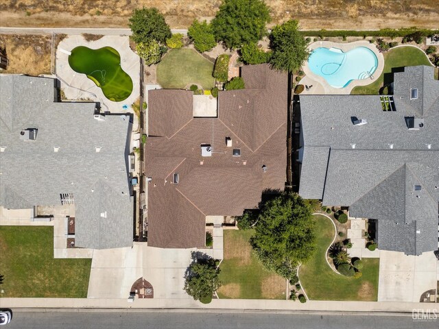 9408 Wandering Oak Dr, Bakersfield, CA 93311 - drone / aerial view of a pool area