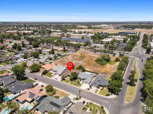 9408 Wandering Oak Dr, Bakersfield, CA 93311 - aerial view of property and surrounding area featuring a pool