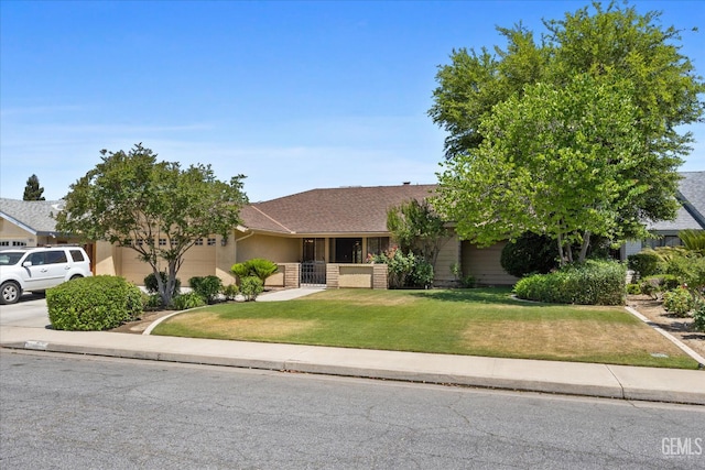 9408 Wandering Oak Dr, Bakersfield, CA 93311 - view of front of house featuring a garage, a front lawn, driveway, and roof with shingles