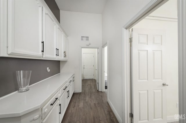 10505 Finchley Dr, Bakersfield, CA 93311 - corridor with baseboards and dark wood-style floors