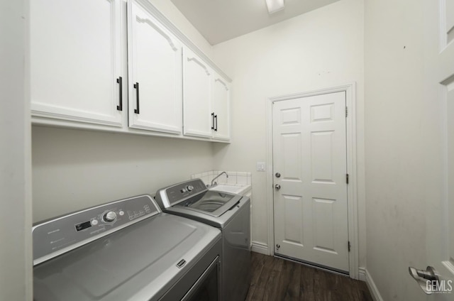 10505 Finchley Dr, Bakersfield, CA 93311 - laundry area with cabinet space, washing machine and clothes dryer, dark wood-type flooring, and baseboards