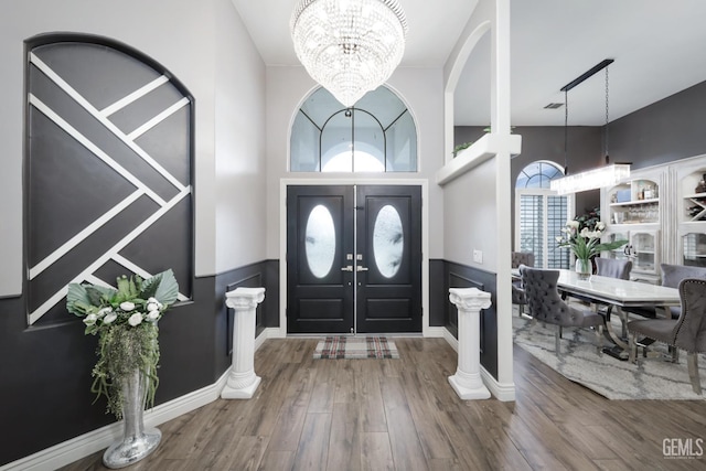 10505 Finchley Dr, Bakersfield, CA 93311 - foyer featuring a chandelier and wood finished floors