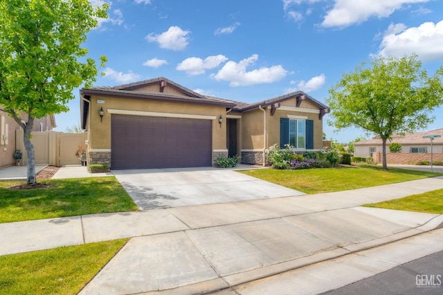view of front facade featuring a front lawn, stucco siding, an attached garage, and stone siding