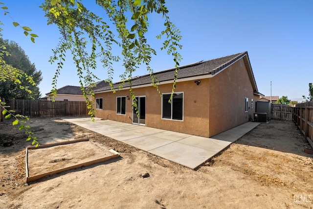 6522 Bangor Pl, Bakersfield, CA 93313 - rear view of property with a fenced backyard, stucco siding, and a patio area