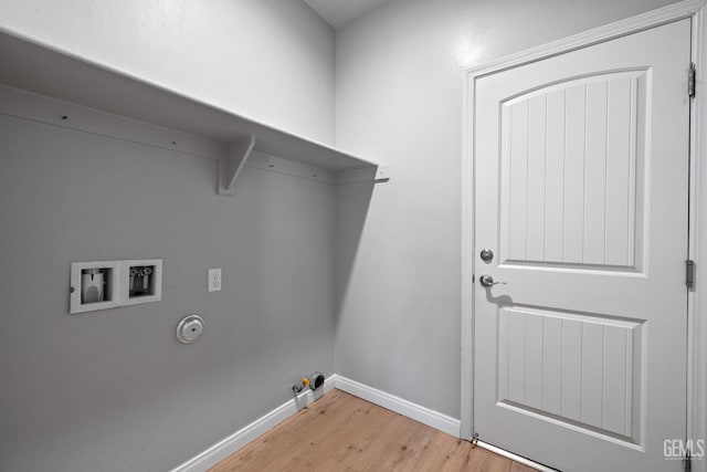 6522 Bangor Pl, Bakersfield, CA 93313 - laundry room with hookup for a gas dryer, light wood finished floors, and hookup for a washing machine