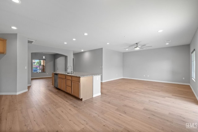6522 Bangor Pl, Bakersfield, CA 93313 - kitchen with arched walkways, ceiling fan, open floor plan, light wood-style floors, and recessed lighting