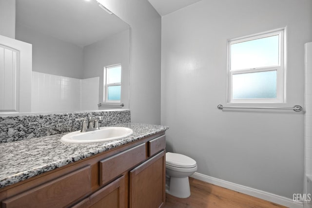 6522 Bangor Pl, Bakersfield, CA 93313 - full bath with wood finished floors, vanity, and a shower