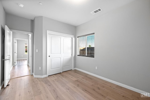 6522 Bangor Pl, Bakersfield, CA 93313 - unfurnished bedroom featuring light wood-style floors and a closet