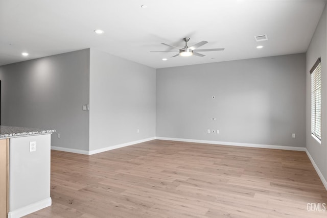 6522 Bangor Pl, Bakersfield, CA 93313 - empty room with a ceiling fan, light wood finished floors, and recessed lighting