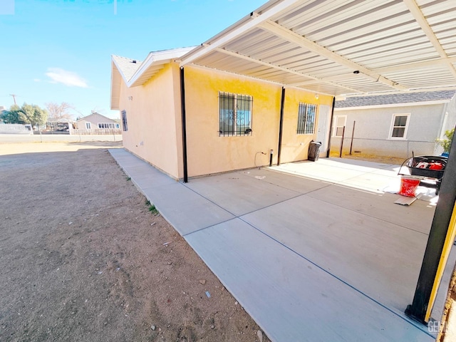 exterior space with a patio