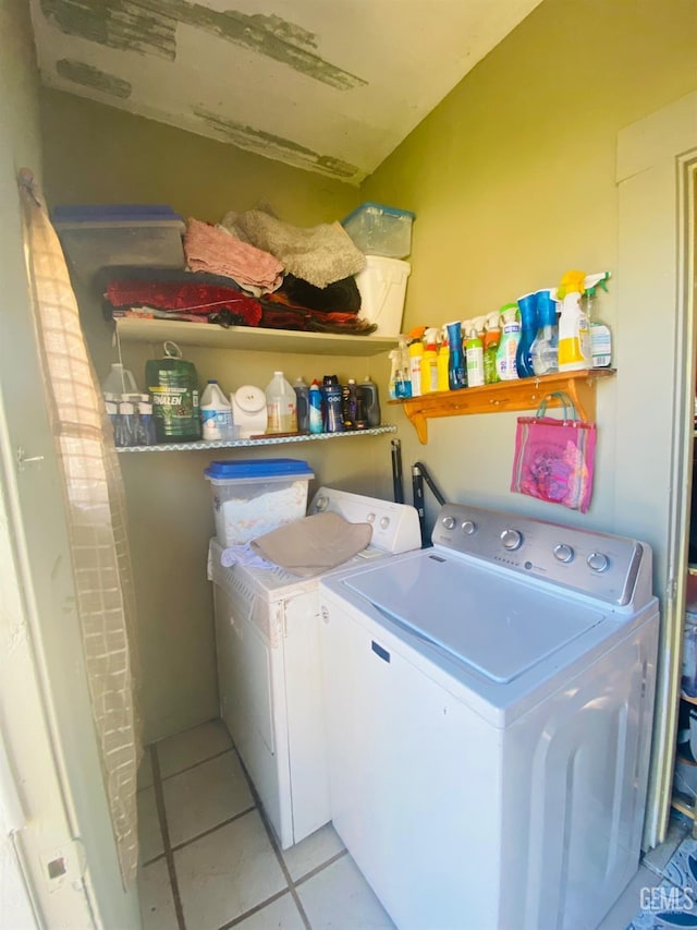 706 L St, Bakersfield, CA 93304 - washroom with independent washer and dryer and light tile patterned floors