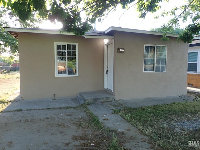 view of front of property featuring stucco siding