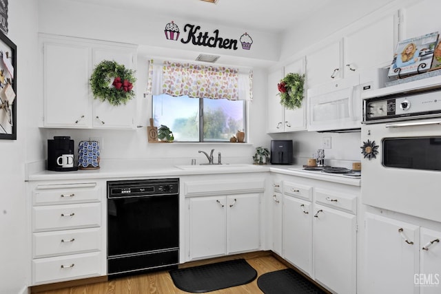 1112 Pebble Beach Dr, Bakersfield, CA 93309 - kitchen with white appliances, light countertops, white cabinetry, and light wood-style flooring