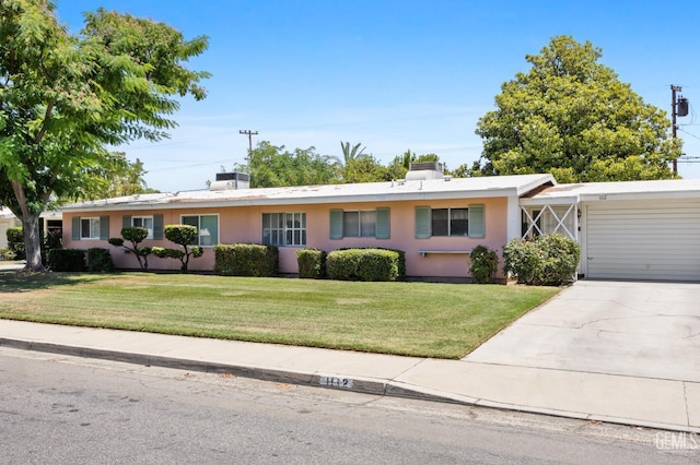 1112 Pebble Beach Dr, Bakersfield, CA 93309 - ranch-style house featuring a front lawn, stucco siding, and driveway