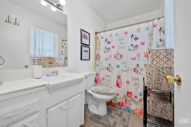 1112 Pebble Beach Dr, Bakersfield, CA 93309 - bathroom with vanity, wood finished floors, and a shower with shower curtain