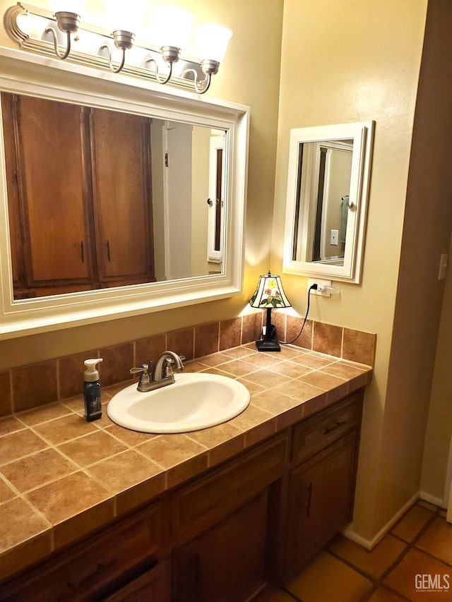 6333 Crestmore St, Bakersfield, CA 93308 - bathroom featuring vanity and tile patterned flooring
