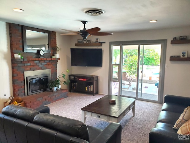 6333 Crestmore St, Bakersfield, CA 93308 - living area featuring carpet floors, a ceiling fan, and a fireplace