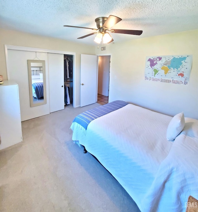 6333 Crestmore St, Bakersfield, CA 93308 - carpeted bedroom featuring a closet, a ceiling fan, and a textured ceiling